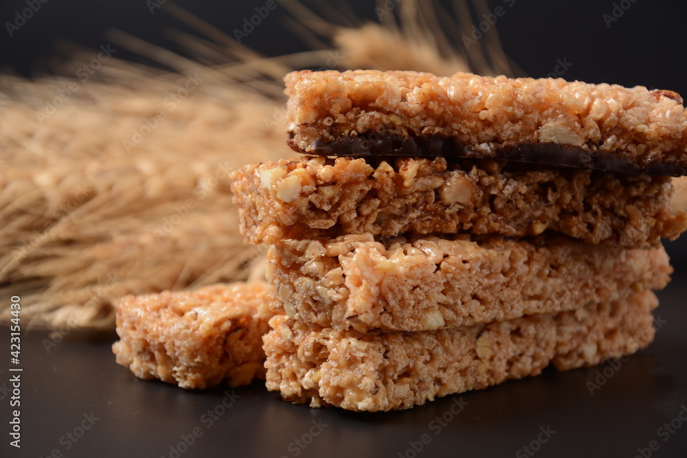 Various healthy granola bars (muesli or cereal bars). Set of energy, sport, breakfast and protein bars. Puffed rice, berries, chocolate, oatmeal, almond and honey cereal bars. Various healthy granola bars (muesli or cereal bars). Set of energy, sport, breakfast and protein bars. Puffed rice, berries, chocolate, oatmeal, almond and honey cereal bars.