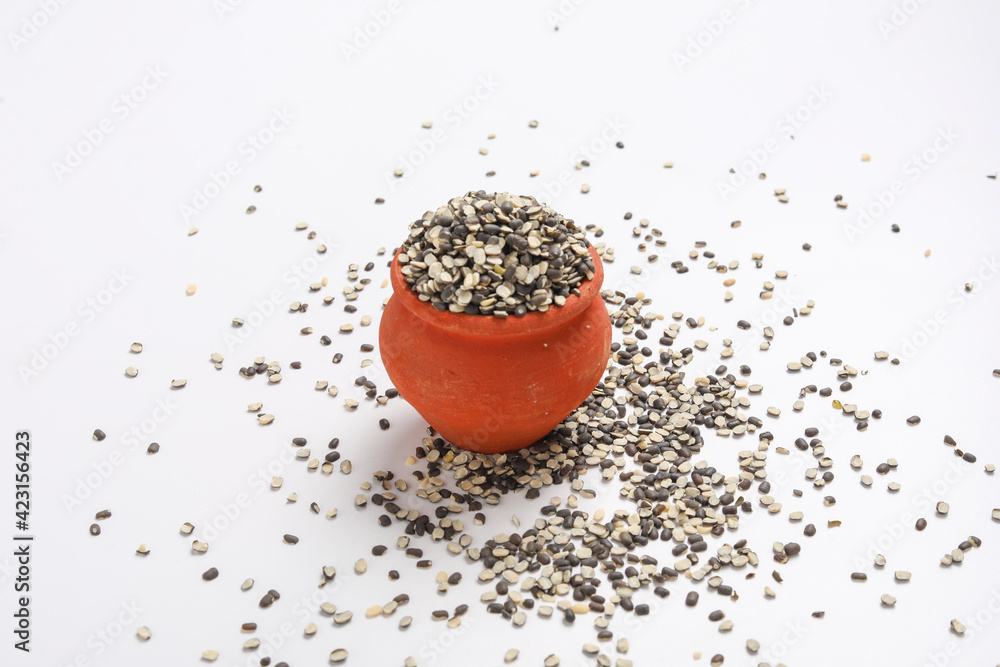 Split Black Lentil Also Know as Black Gram, Black Urad Dal, Vigna Mungo, Urad Bean on White Background Split Black Lentil Also Know as Black Gram, Black Urad Dal, Vigna Mungo, Urad Bean on White Background