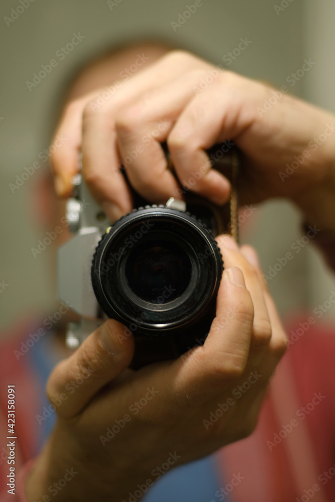 man holding camera man holding camera