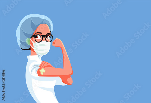Female Doctor Showing Vaccinated Arm
