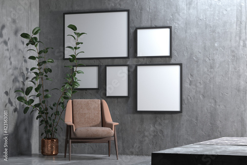 Minimal. grey living room interior with black fabric armchair, plants and frames on grey wall background.3d rendering.
