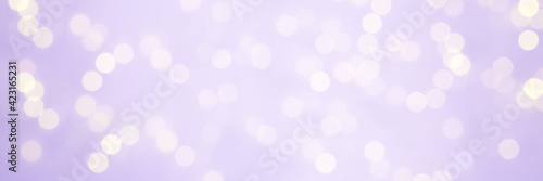淡い紫と暖色系の光の背景（お祝い）