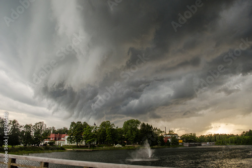 Dark storm clouds in Aluksne, Latvia photo