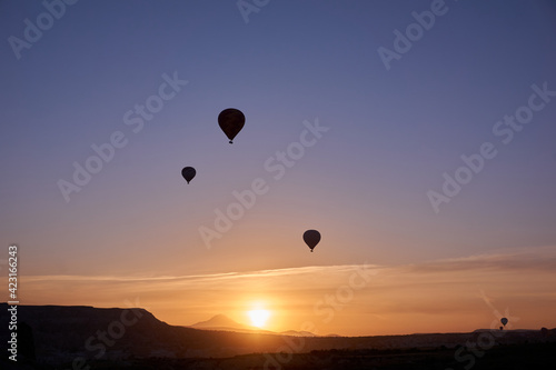 Hot air balloons at sunrise in Cappadocia, Turkey © Altan