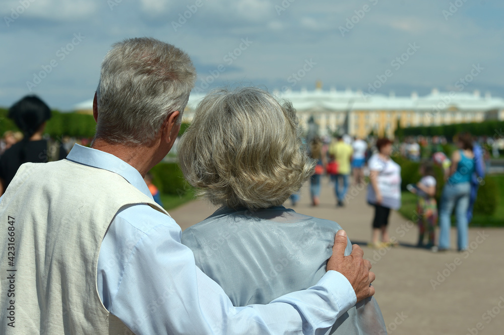 beautiful happy Mature couple traveling. back view beautiful happy Mature couple traveling. back view