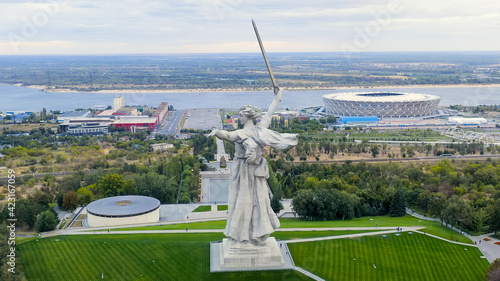 Volgograd, Russia. Evening view of the sculpture Motherland Calls! on the Mamaev Kurgan in Volgograd. Cloudy weather, Aerial View photo