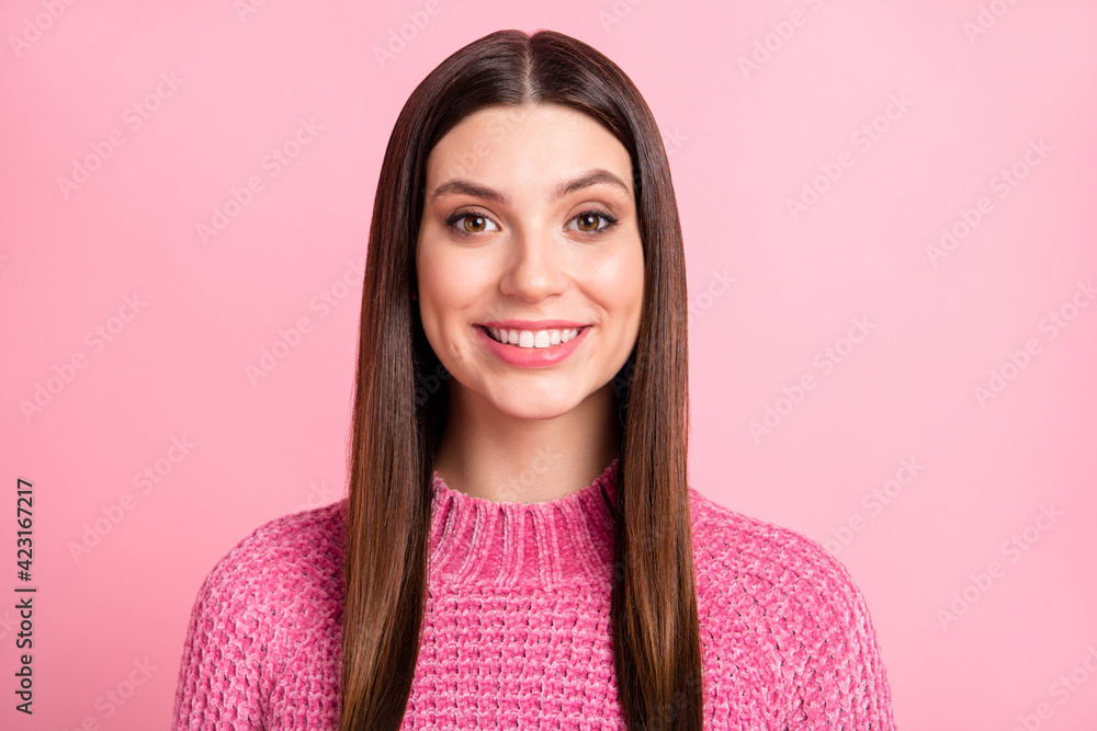 Portrait of brunette optimistic lady wear pink sweater isolated on crimson color background Portrait of brunette optimistic lady wear pink sweater isolated on crimson color background
