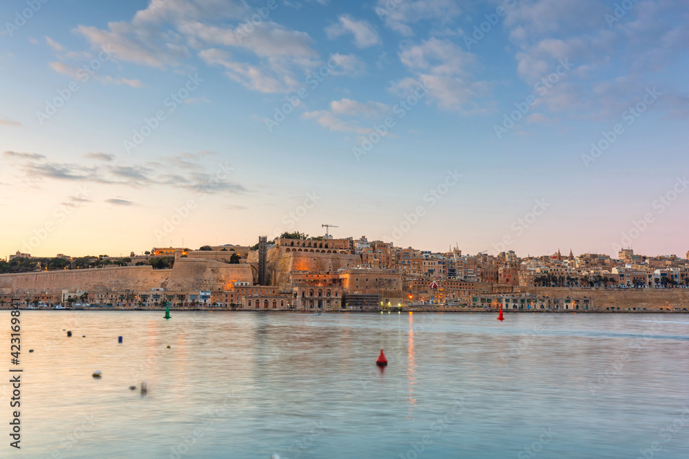 Beautiful coastline of Valletta city at sunset, Malta.