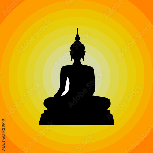 A beautiful silhouette of Buddha with glowing yellow background. Concept about religion, faithful, Buddha, Buddhist. 