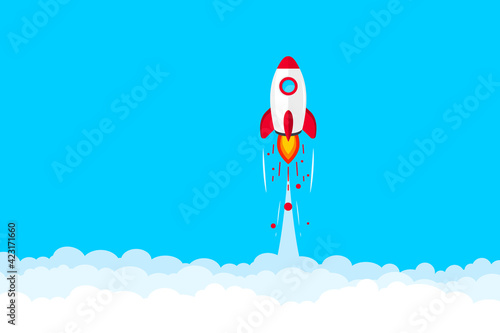 Rocket launch. Space rocket launch. Rocket flying in clouds. Successful startup business concept. New project start up. Creative or innovative idea. Launching new product or service. Rocket taking off