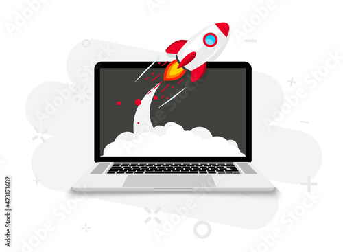 Rocket launch from laptop screen. Rocket taking off. Business Start up, Launching new product or service. Successful start-up launch new business project. Creative or innovative idea. Rocket launch photo