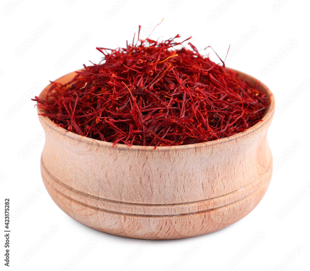 Fototapeta premium Dried saffron in wooden bowl isolated on white