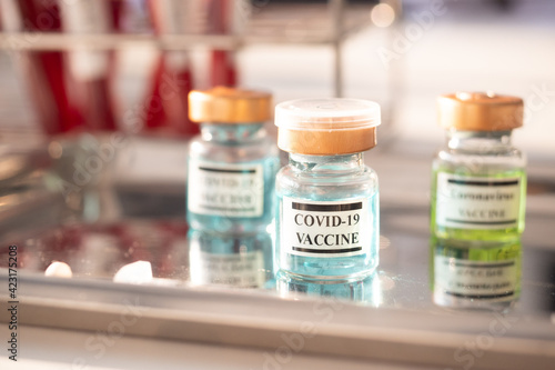 Close up a vial of covid-19 vaccine. Healthcare And Medical concept.