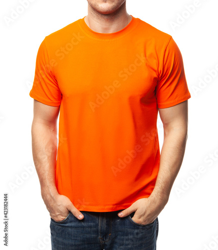 Blank orange tshirt on young man template isolated on white