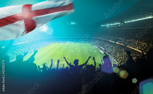 crowded football stadium with english flag