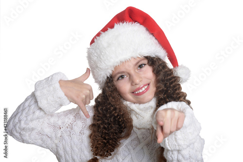 Portrait of smiling little girl with Christmas hat