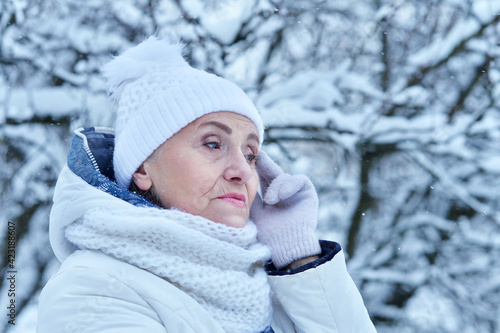 Upset beautiful senior woman