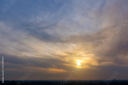 Gorgeous panorama early morning with lining cloud on the orange sky scenic of the strong sunrise