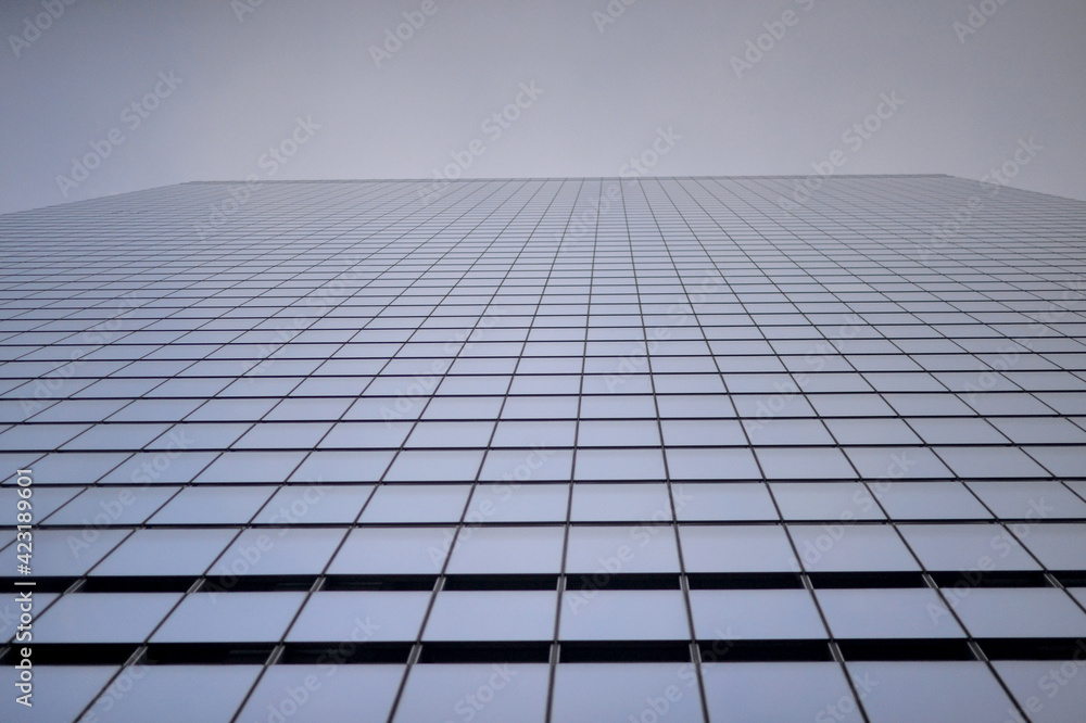 glass facade of modern office building glass facade of modern office building