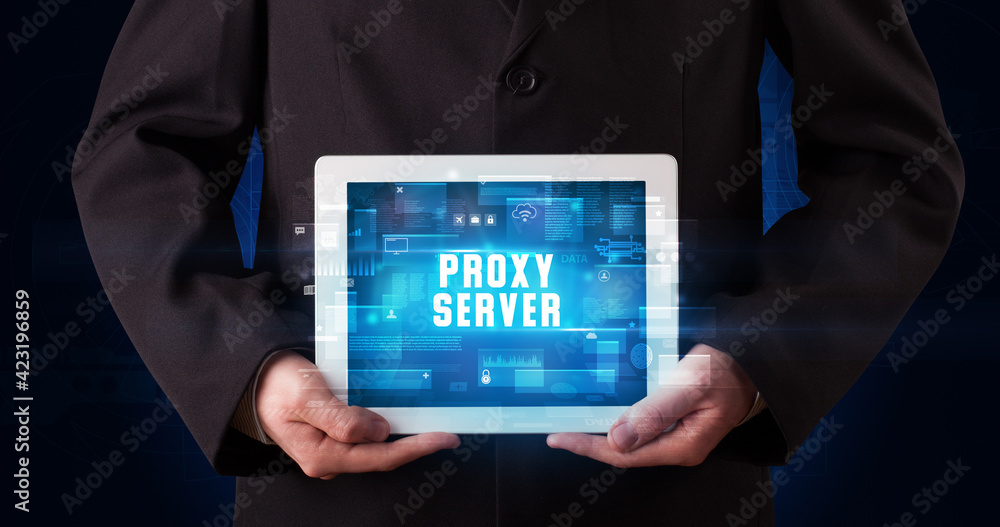Person holding tablet, security concept Person holding tablet, security concept