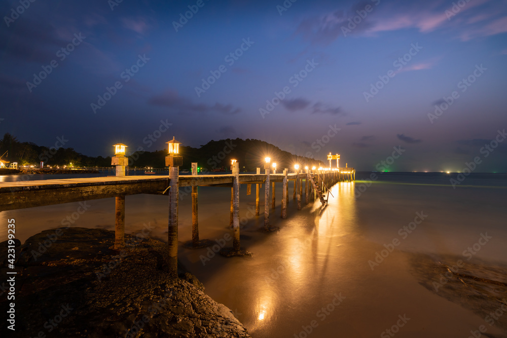 A wooden bridge into the sea in Kood island, Thailand