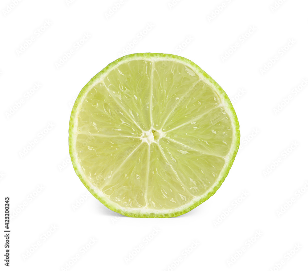 Cut lime isolated on white. Exotic fruit