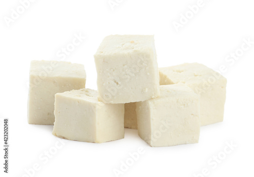 Pieces of delicious tofu on white background. Soybean curd