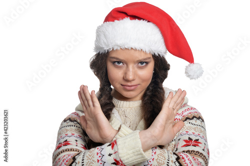 Portrait of smiling young woman in Christmas hat
