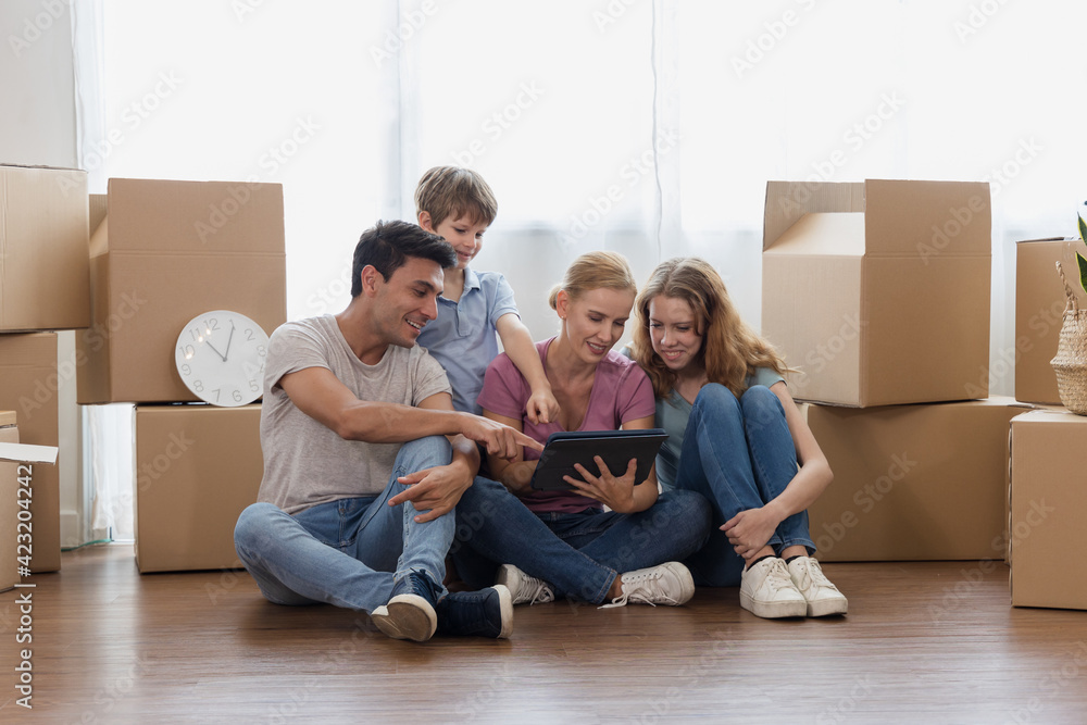 family Parents and children shop for new furniture through at home family Parents and children shop for new furniture through at home