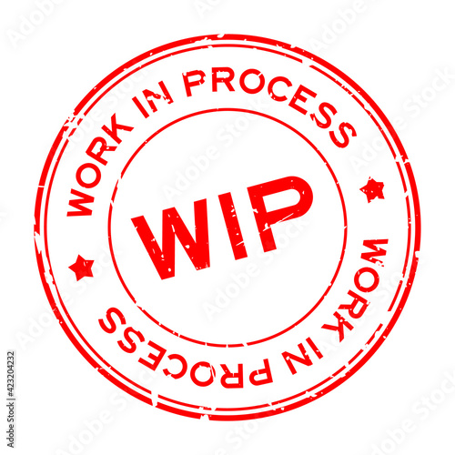 Grunge red WIP work in process word round rubber seal stamp on white background