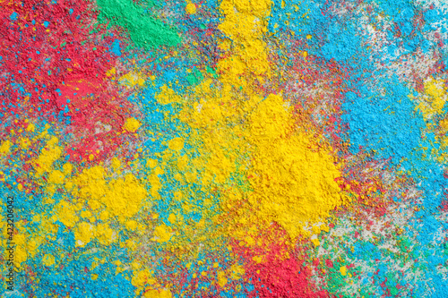 Konstfotografi Colorful powder dyes as background, top view. Holi festival
