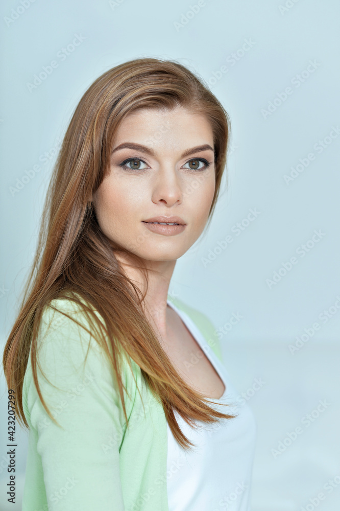 portrait of beautiful young woman posing in studio portrait of beautiful young woman posing in studio