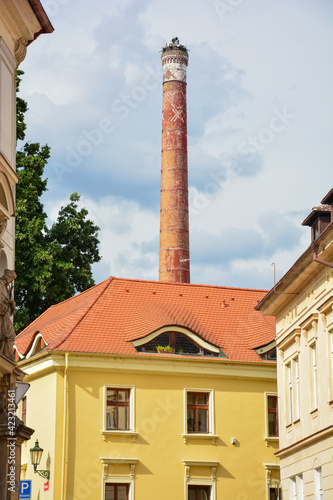 Roof of a yellow house with chimneys in Litoměřice Leitmeritz in the Czech Republic