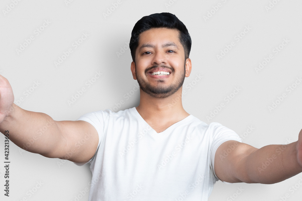 Close up photo amazing he him his young age asian pakistani perfect appearance easy-going person make take selfies sincere smile wear white t-shirt isolated white background Close up photo amazing he him his young age asian pakistani perfect appearance easy-going person make take selfies sincere smile wear white t-shirt isolated white background