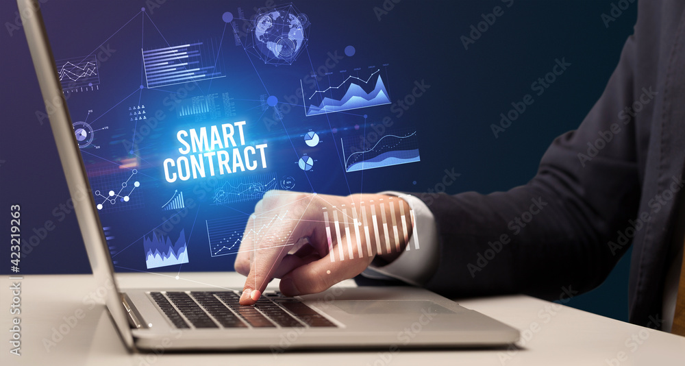 Businessman working on laptop, business concept Businessman working on laptop, business concept