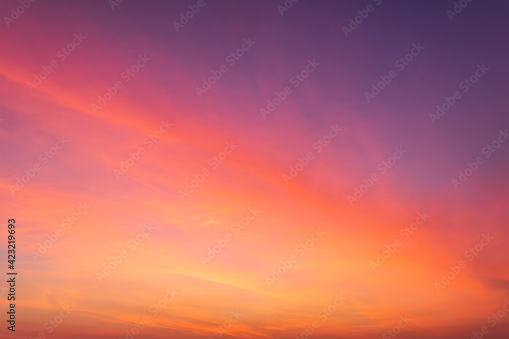 sunset sky in the evening with colorful red sunlight background 