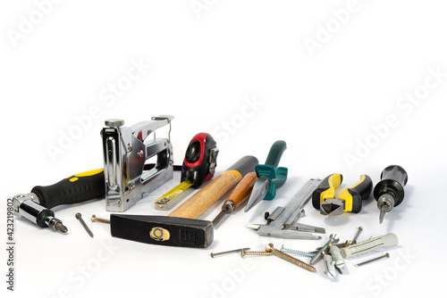 Repair tools and various parts on a white background