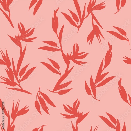 Pink seamless pattern with red silhouettes of Heliconia bihai tropical flowers. Vector pattern for fabrics, clothes, for wrappers and packages, wallpaper, pastel linen and textiles, cosmetics
