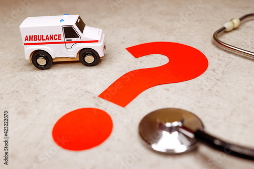 An ambulance with red question mark.