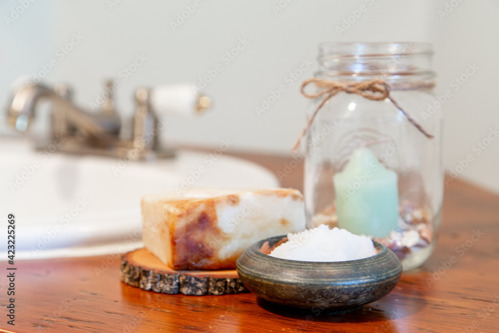 Natural personal care items on a wooden bathroom counter Natural personal care items on a wooden bathroom counter