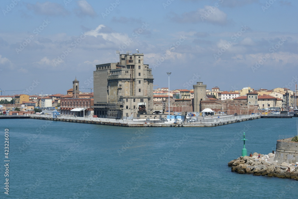 Approaching the port of Livorno: view of the old grain silos and of the old fortress