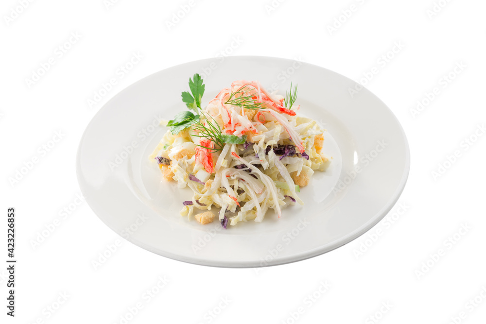 Seafood salad with crab and cabbage isolated on white background