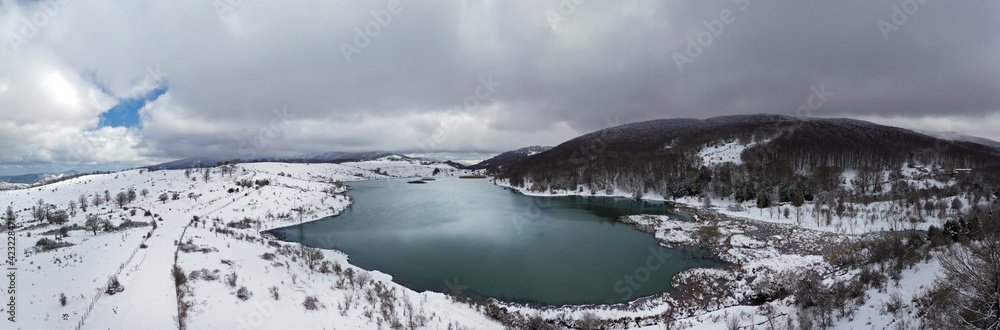 180 degree virtual reality panorama of Lake Biviere immersed in the beautiful beech forest of Monte Soro in winter on Nebrodi, Sicily, Italy. Natural lake with views of Mount Etna and the sea. Sicily.