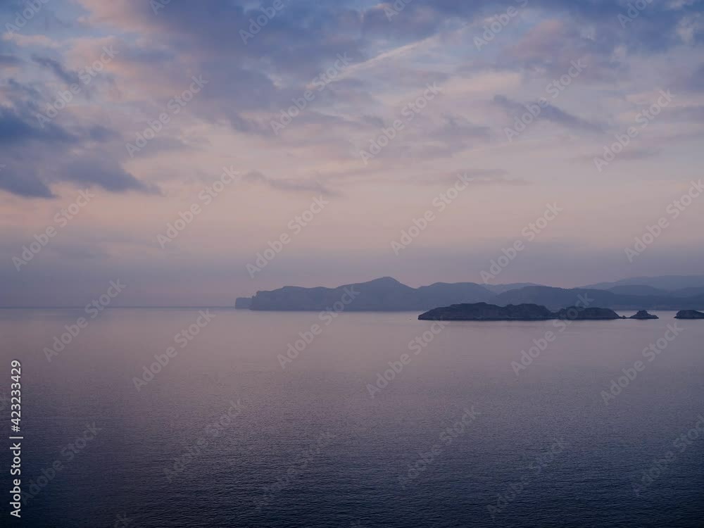 time lapse of a sunset over some islands off the coast in winter, malgrats islands time lapse of a sunset over some islands off the coast in winter, malgrats islands