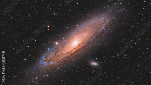 Andromeda Galaxy with colorful Stars surrounding it captured with a Telescope