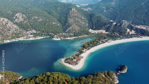 Aerial View with Oludeniz Blue Lagoon Beach in Turkey Ölüdeniz. Blue Lagoon with Turquise Water Aerial Scene in UHD 4K