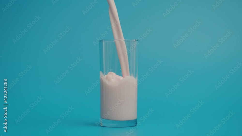 Slow Motion of pouring Milk in Transparent Glass at 1000 fps Slow Motion of pouring Milk in Transparent Glass at 1000 fps