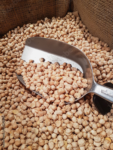 Сhickpeas with a ladle in t...