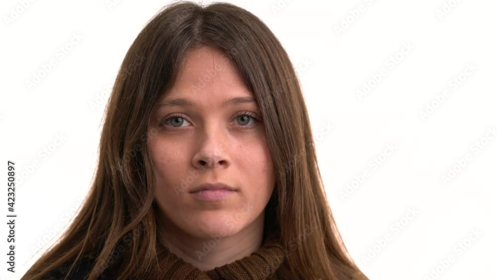 Young woman Having fun, Posing at camera, close up on white Background Young woman Having fun, Posing at camera, close up on white Background