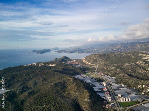 High angle drone aerial view of greenhouse fields of greens plantation in Demre - Antalya province, Turkey
